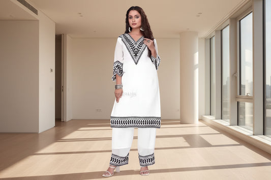 Premium white rayon kurti set with black ethnic embroidery and elegant border design