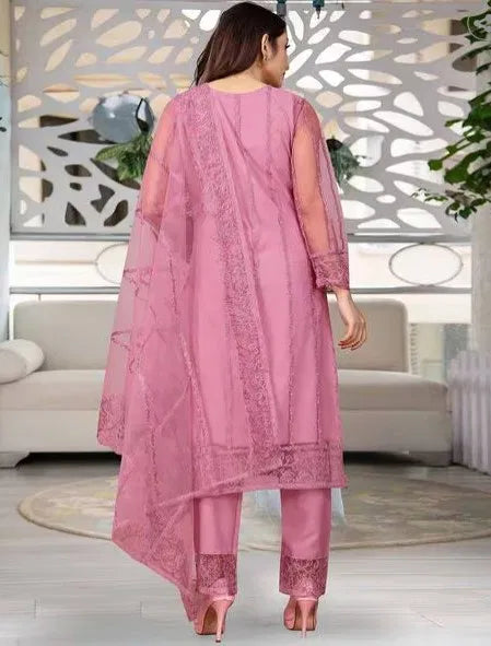 Premium rayon kurti set in soft pink, sheer dupatta, elegant ethnic embroidery, living room setting