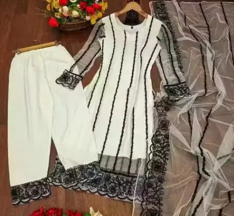 Premium white rayon kurti set with black embroidered borders and matching dupatta