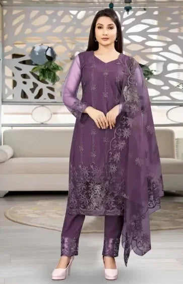 Premium purple ethnic suit set with sheer floral embroidery, showcasing high-quality fabric and elegant design.