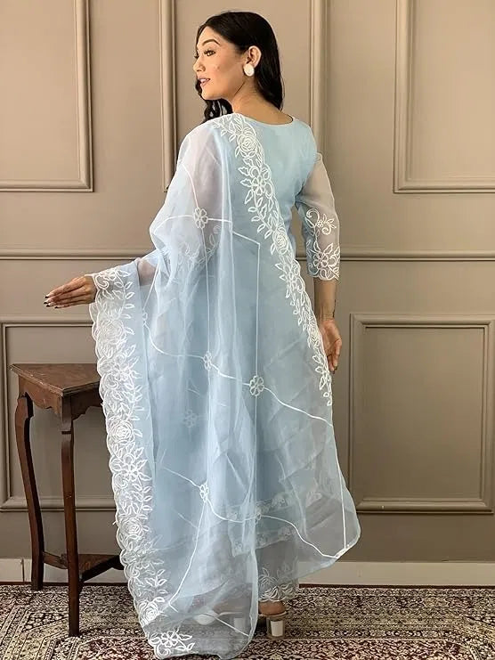 Woman in pastel blue rayon kurti set with sheer white embroidered dupatta, ethnic design