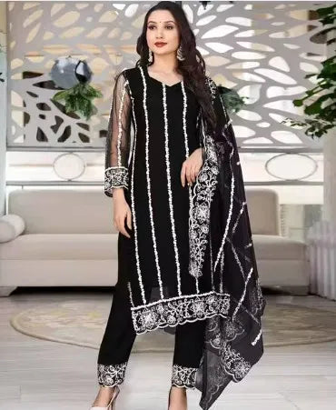 Premium black rayon kurti set with white ethnic embroidery, sheer sleeves, and elegant dupatta.
