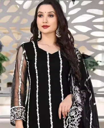 Elegant black rayon kurti set with white embroidery, sheer sleeves, and ethnic design detail.