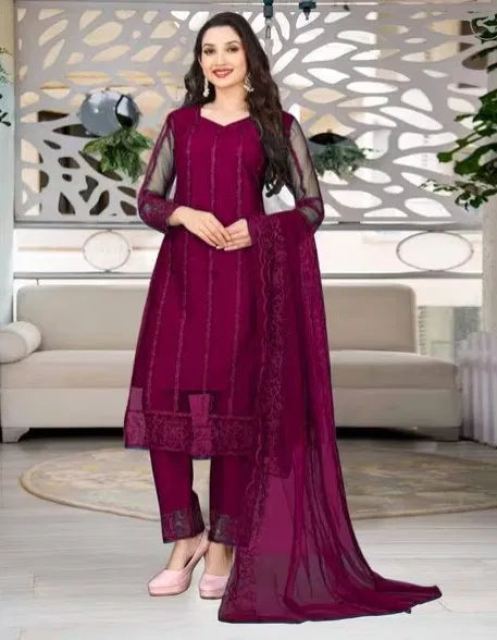 Premium maroon rayon kurti set with intricate ethnic embroidery and sheer sleeves.